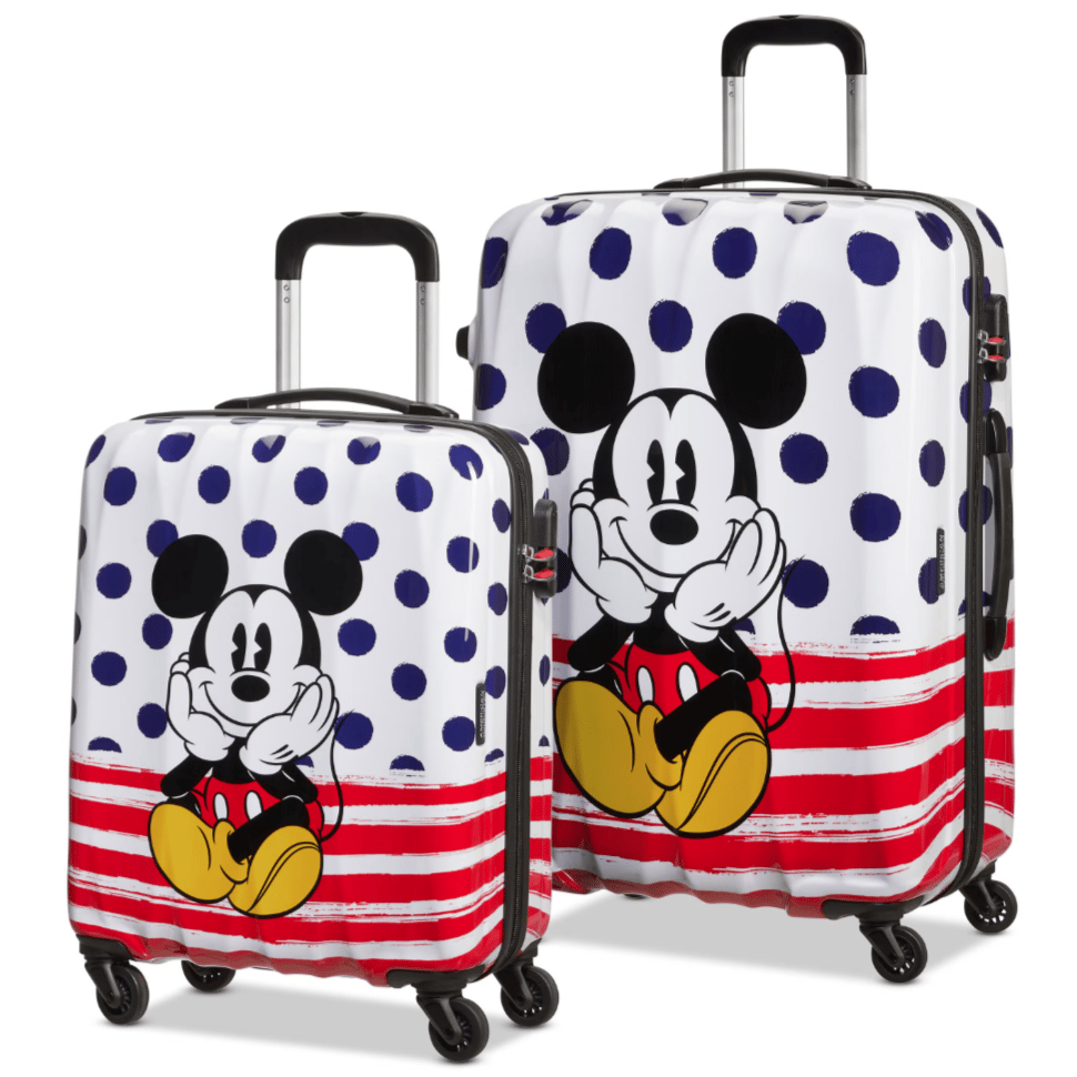 Two suitcases featuring a cartoon mouse design with polka dots and red stripes, equipped with black handles and four wheels for mobility.