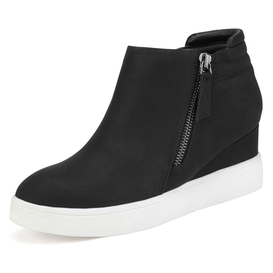 Black ankle boot with a side zipper and a white platform wedge sole.