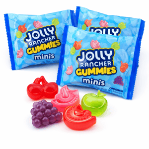 Jolly Rancher Gummies Minis are shown with packets and colorful fruit-shaped gummies in flavors like cherry, watermelon, apple, and grape.
