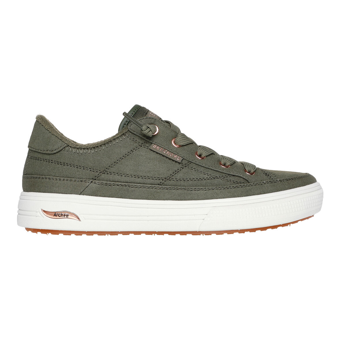 Olive green low-top sneaker with fabric upper, white midsole, and brown rubber outsole. Features \“Arch Fit\“ support, lace-up design, and subtle branded accents in metallic tones.