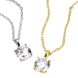 Two necklaces with round clear gemstones: one with a silver chain and setting, the other with a gold chain and setting.