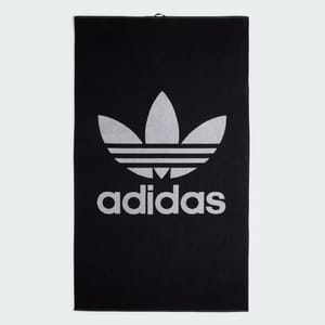 A black towel with a large gray Adidas logo in the center.
