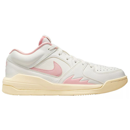 Nike Jordan Stadium 90 Shoes feature a low-top design with a white base, pink Swoosh, and accents on the sides. They have a cream-colored sole and a subtle retro-inspired silhouette, combining casual style with sporty elements.