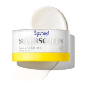 Supergoop! Superscreen Daily Moisturizer with SPF 40, in a jar with yellow and white packaging, offers sun protection and hydration.