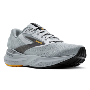A gray Brooks running shoe featuring a mesh upper, lace-up closure, and cushioning sole, designed for stability and comfort.