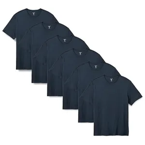 A set of six navy blue crew neck T-shirts is displayed, arranged in a staggered formation.
