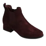 A maroon suede Chelsea boot with a low block heel and elastic side panels.