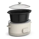 Slow cooker with a detachable black inner pot and a glass lid, featuring simple control buttons on the front.