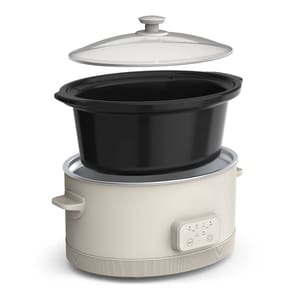 Slow cooker with a detachable black inner pot and a glass lid, featuring simple control buttons on the front.
