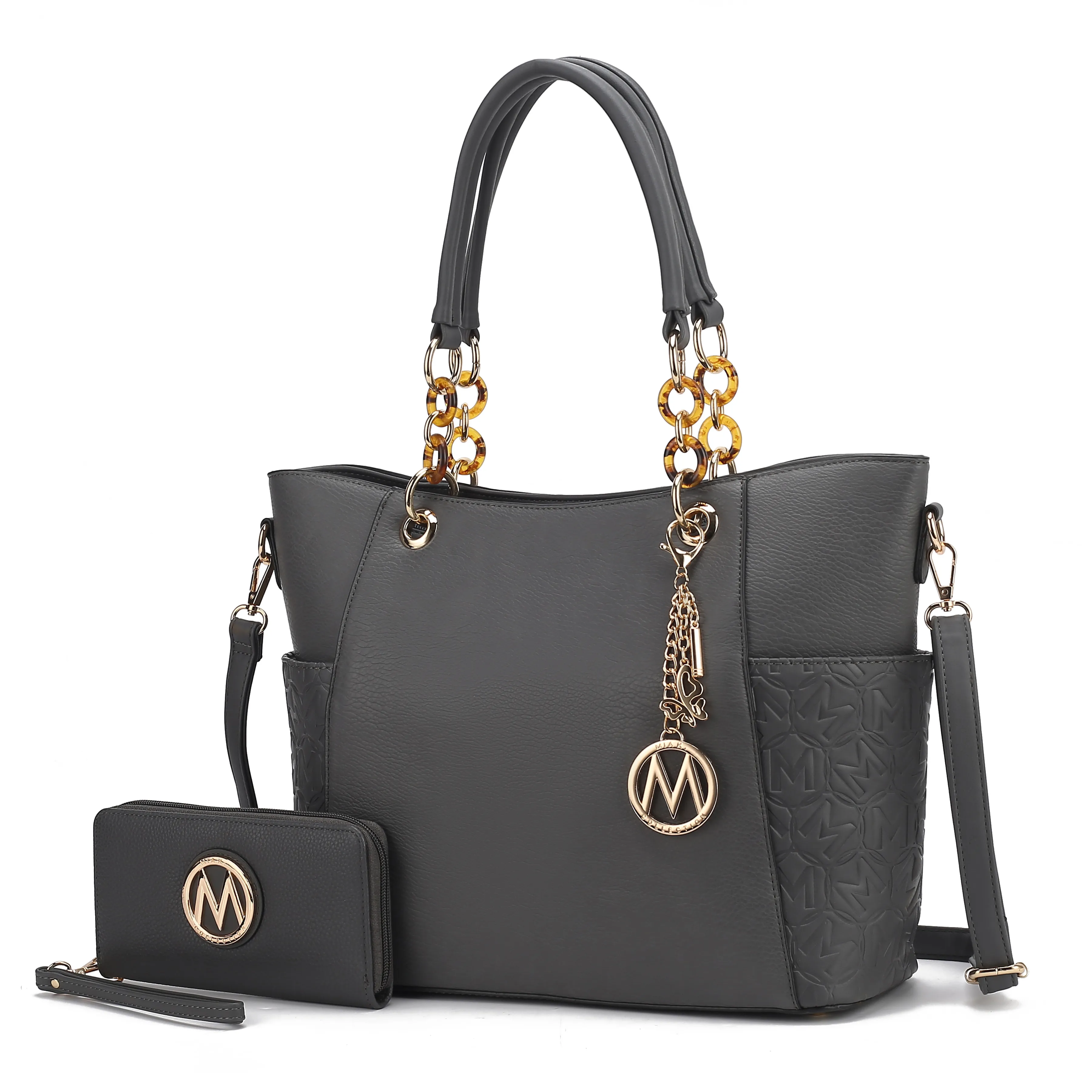 A dark gray handbag with chain handles and a detachable shoulder strap, featuring a gold \“M\“ emblem. Accompanied by a matching wallet with the same emblem.