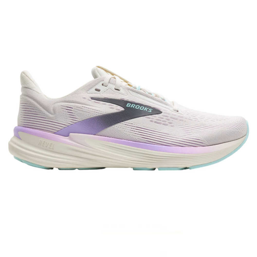 Brooks Revel 6 running shoe features a pastel design with a white upper, purple and teal accents, and a cushioned sole.