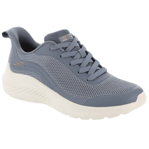 A blue athletic sneaker with mesh material and a white textured sole, featuring laces and branding on the tongue.