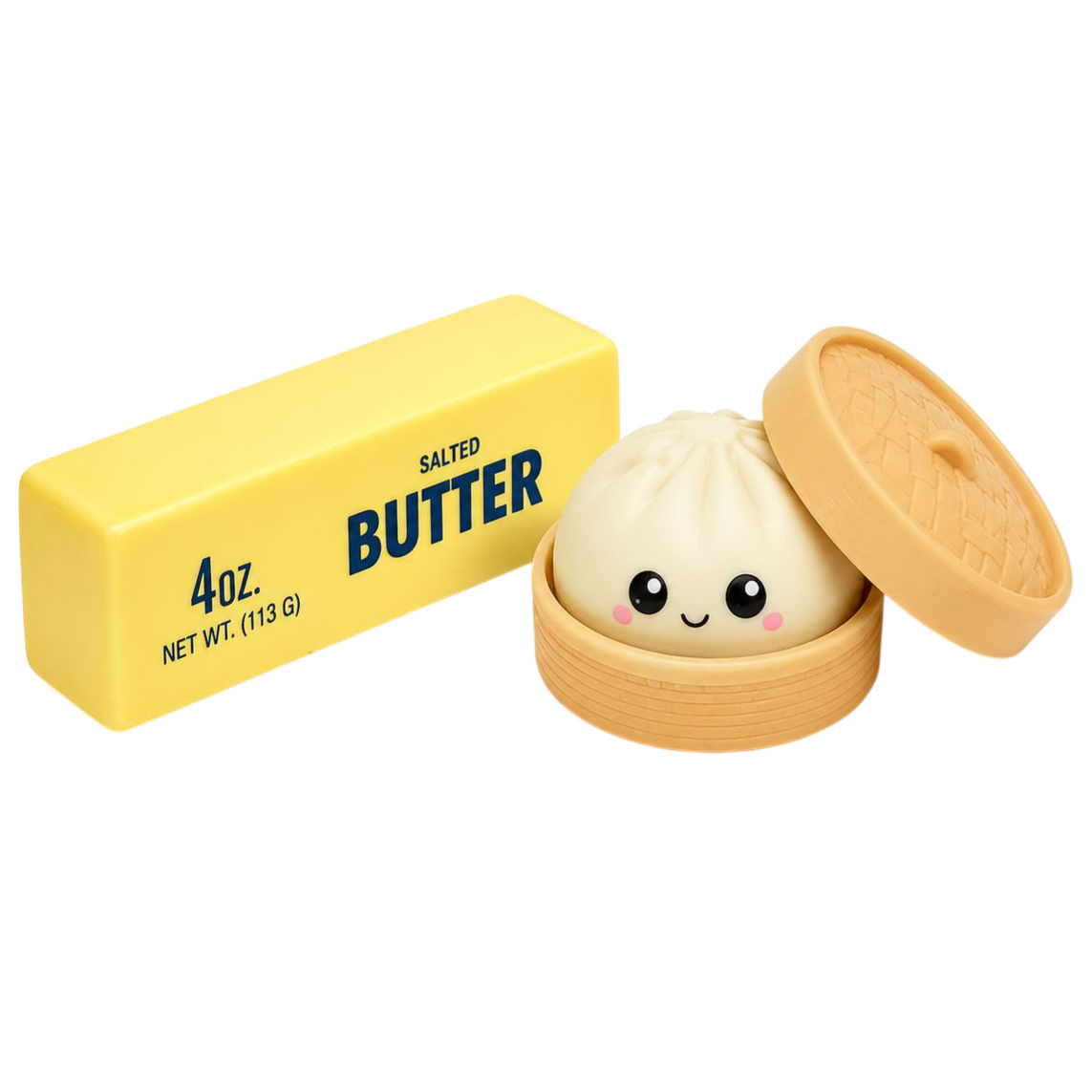 A cute dumpling toy with a smiling face is placed in a small steamer basket next to a rectangular yellow package labeled \“Salted Butter\“ weighing 4 oz (113 g).