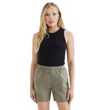 A woman is wearing a black sleeveless top and olive green, elastic-waist shorts, providing a casual and comfortable summer look.