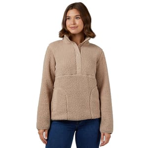 A beige sherpa pullover with a half-button front, high collar, and kangaroo pocket, paired with blue jeans.
