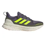 A water-repellent sneaker with a gray and neon yellow design, featuring the Adidas three-stripe logo and a speckled white sole.