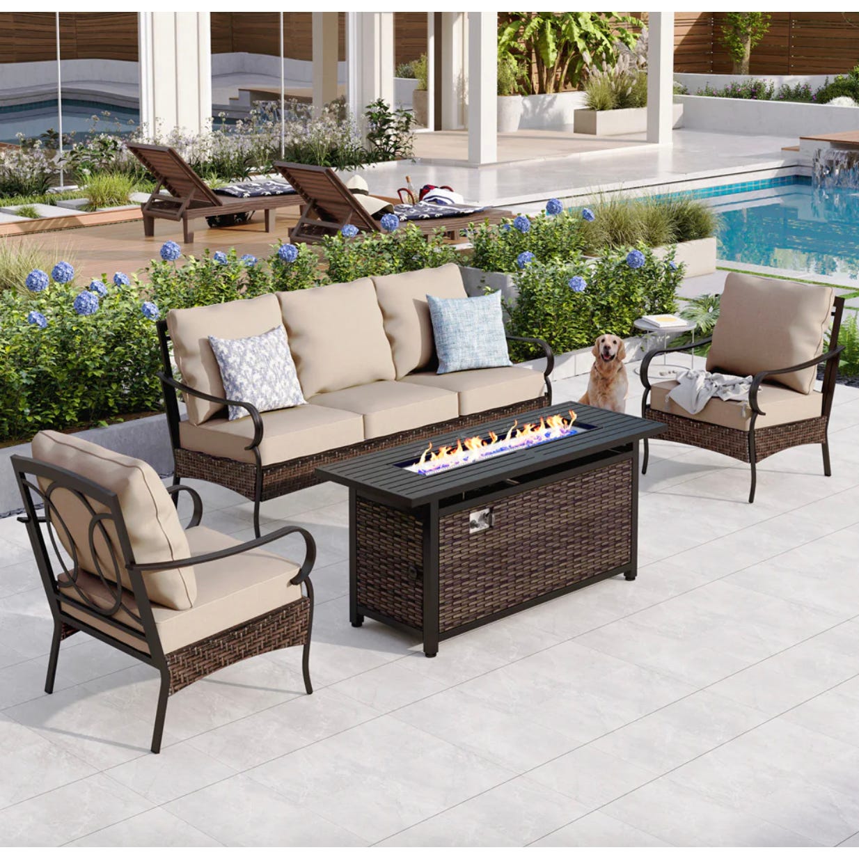 Outdoor furniture set with a sofa, two armchairs, and a fire pit table, accompanied by a dog sitting nearby.