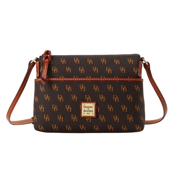 A Dooney & Bourke crossbody bag featuring a brown monogram pattern with \“DB\“ initials and tan leather accents, plus a front logo patch.