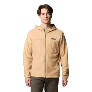 A man wearing a beige Columbia fleece jacket with a full zipper and a hood.