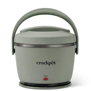 A portable Crockpot lunch warmer with a handle and power indicator, designed for warming meals on the go.