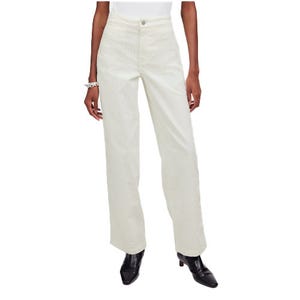 Madewell Emmett Wide-Leg Pants are high-waisted with a wide-leg fit in a light ivory color, featuring a button and zip closure. They offer a classic, relaxed silhouette perfect for casual or dressy occasions.