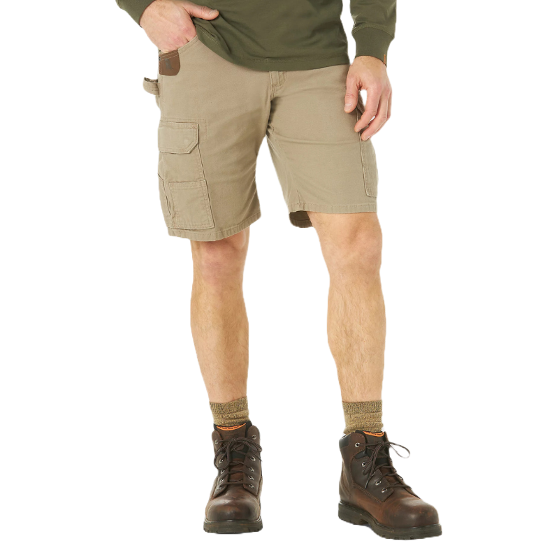 Khaki cargo shorts paired with a green long-sleeve shirt and brown leather work boots with patterned socks.