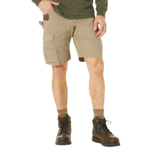Khaki cargo shorts paired with a green long-sleeve shirt and brown leather work boots with patterned socks.