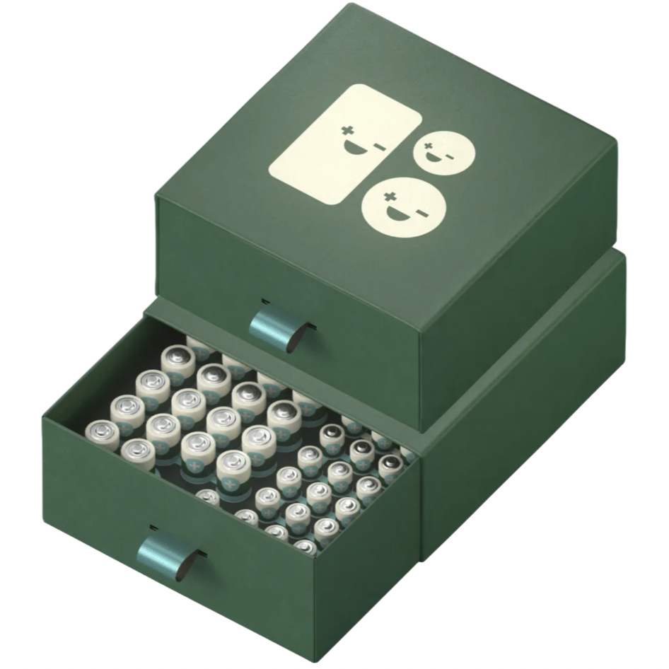 A green organizer case containing 92 batteries, with a pull-out drawer design and a playful smiling face illustration on top. The case is suited for storing batteries neatly and conveniently.