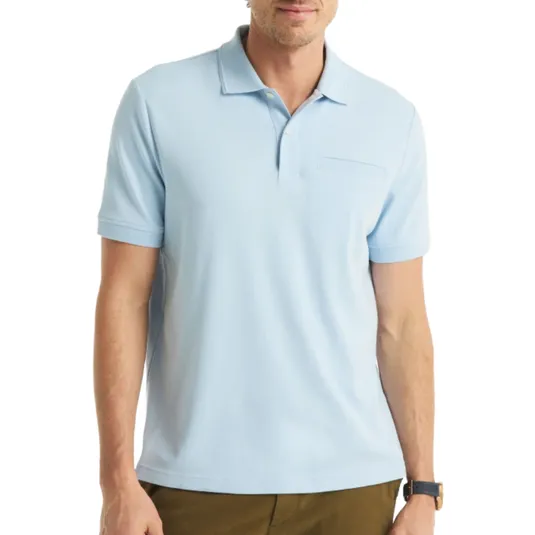 A man is wearing a light blue short-sleeve polo shirt with a collar and a pocket on the chest. He pairs it with brown pants and a watch.