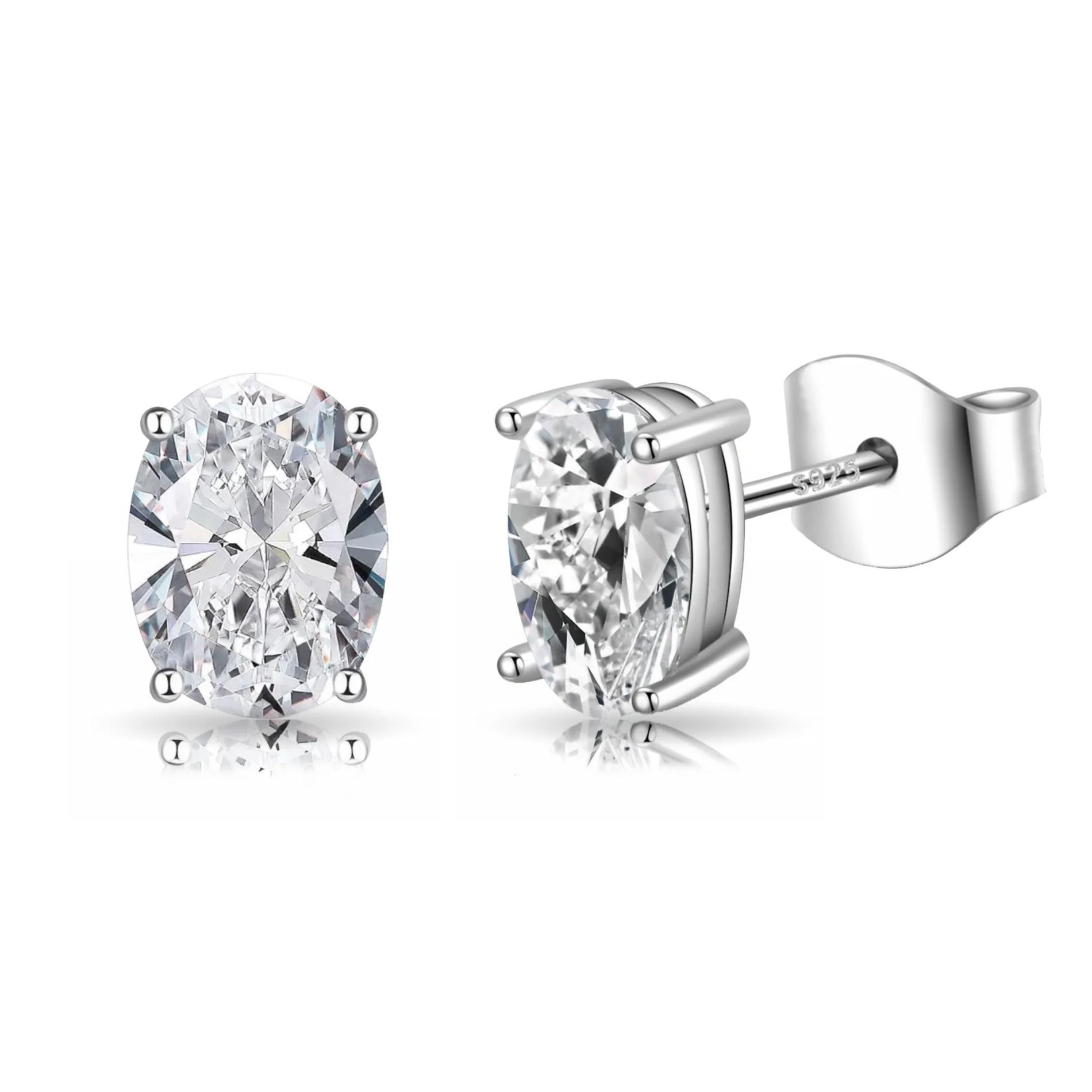 A pair of oval-cut clear gemstone stud earrings set in a four-prong silver setting with butterfly backs, marked \“S925\“ indicating sterling silver.
