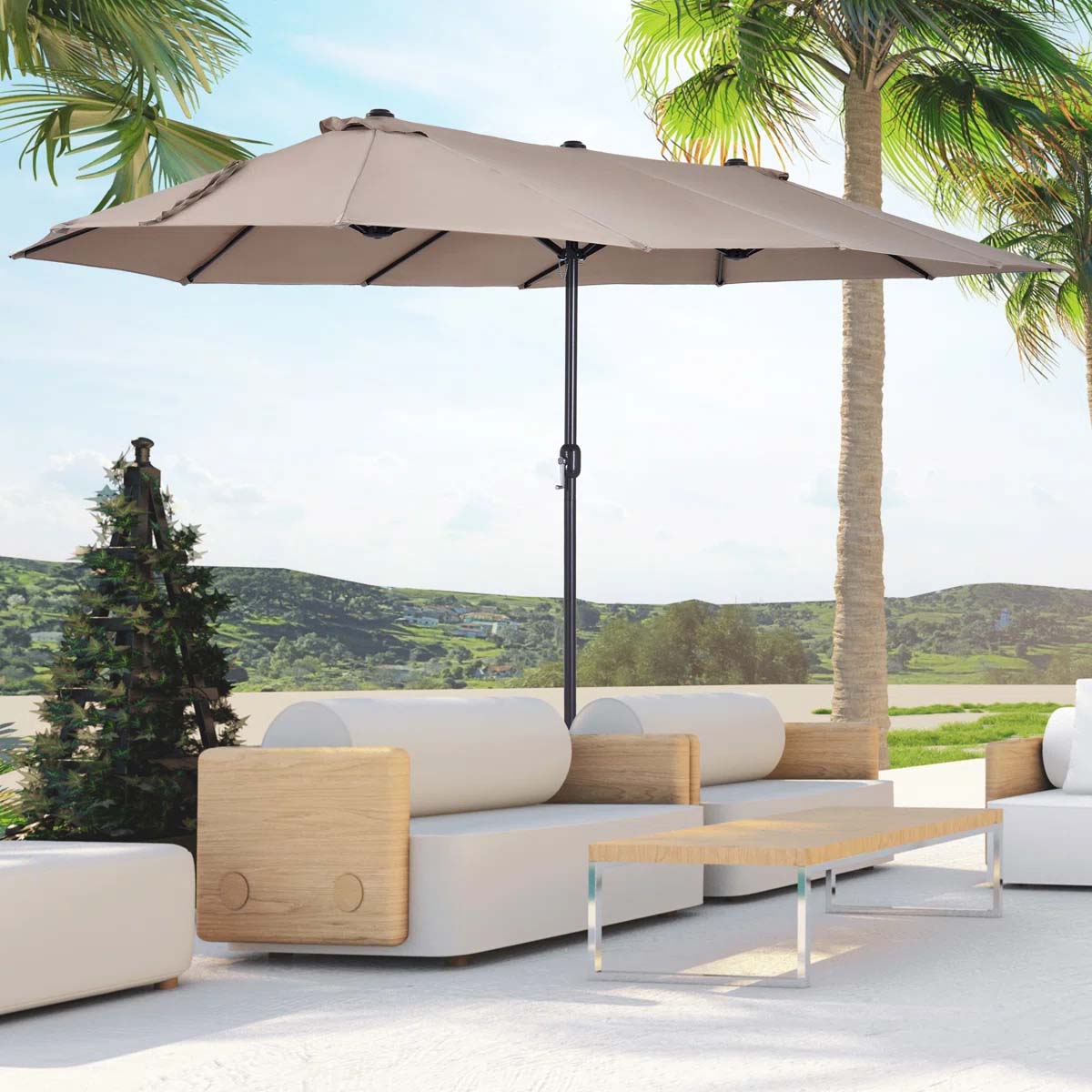 Outdoor patio setup with beige umbrella and modern furniture, featuring white cushioned seats with wooden accents and a sleek wooden table, set against a backdrop of palm trees and greenery.