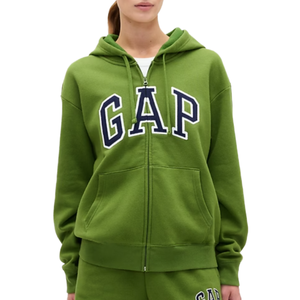 A green GAP zip-up hoodie with a drawstring hood and front pockets, featuring the GAP logo in large white letters outlined in navy.