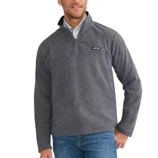 A man is wearing a gray quarter-zip fleece pullover labeled \“Lands' End,\“ paired with a collared shirt and blue jeans.