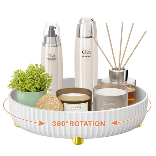 A white Lazy Susan organizer displays skincare bottles, a potted plant, candles, and aroma reeds on a 360-degree rotating base.