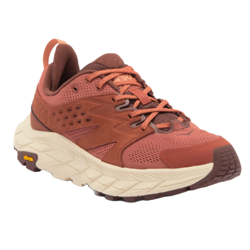 Rust-colored athletic running shoe with a chunky off-white sole and brown accents.