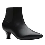 Black ankle boot with a low heel and elastic side panel.