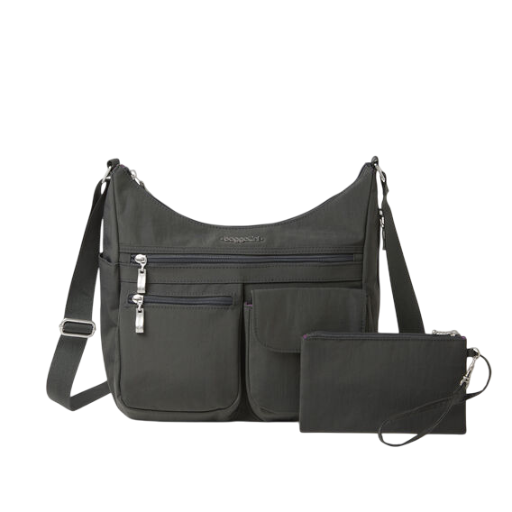 A dark grey crossbody bag with multiple exterior pockets, a zipper pouch, and an adjustable strap. Includes attached wristlet.
