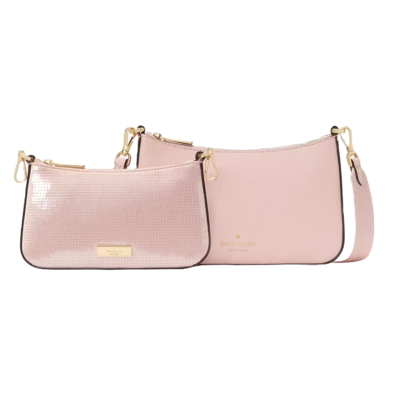The Kate Spade Satin & Sequin Duet Bag features two pink crossbody bags, one with a smooth satin finish and the other with a shimmery sequin texture. Both have gold-tone hardware and detachable straps.