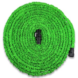 Green 100' flexible garden hose coiled in a spiral, featuring black connectors on each end, designed for easy storage and expansion during use.