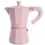 A pink Moka pot with a heart-shaped knob and a curved handle, designed for making stovetop espresso.