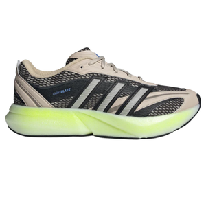 A beige and black athletic shoe with a lime green sole, featuring the \“Lightblaze\“ label and striped side design.