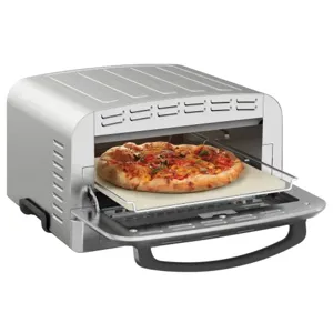 A countertop pizza oven with a pizza inside, featuring a glass door and ventilated design.