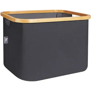 A rectangular dark gray fabric storage bin with a wooden frame, featuring a small handle and a label on the side.