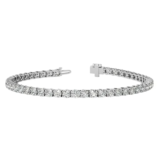 A diamond tennis bracelet featuring a continuous line of diamonds set in a metal band, with a clasp for fastening.