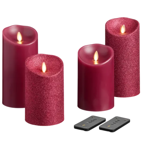 Set of four red flameless LED candles, some with glitter, includes two remote controls.