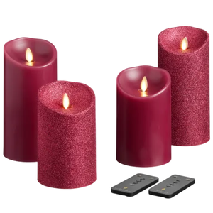 Set of four red flameless LED candles, some with glitter, includes two remote controls.