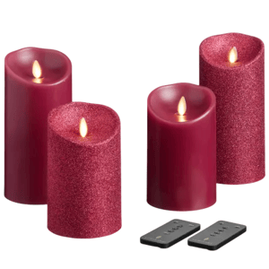 Set of four red flameless LED candles, some with glitter, includes two remote controls.