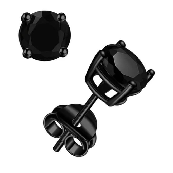 Sterling silver stud earrings featuring round black gemstones set in a four-prong setting, with a push-back closure for secure wear.