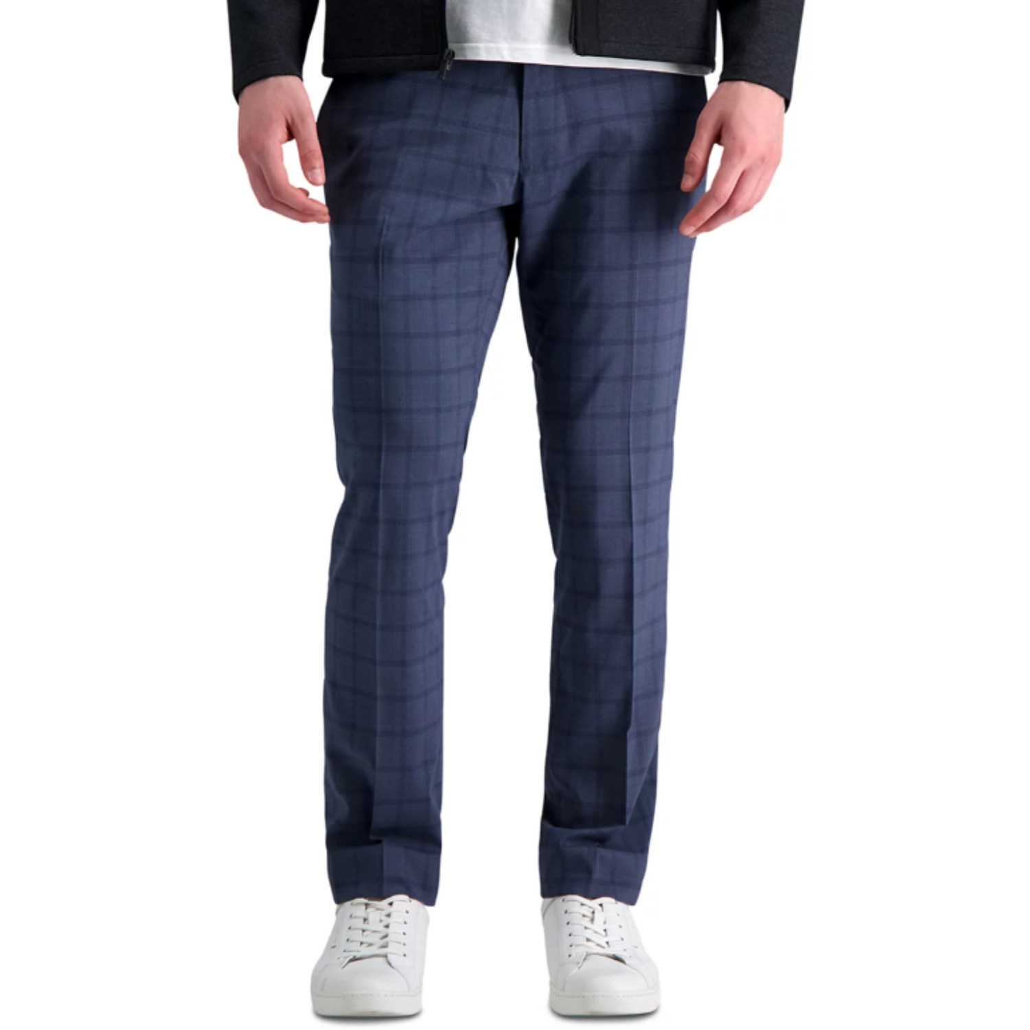 Kenneth Cole dress pants in a blue checkered pattern, featuring a slim fit and paired with white sneakers and a black jacket.
