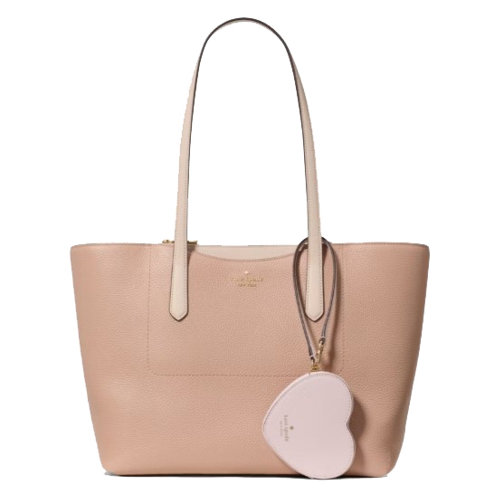 A blush pink tote bag with dual handles and a heart-shaped wristlet attached.